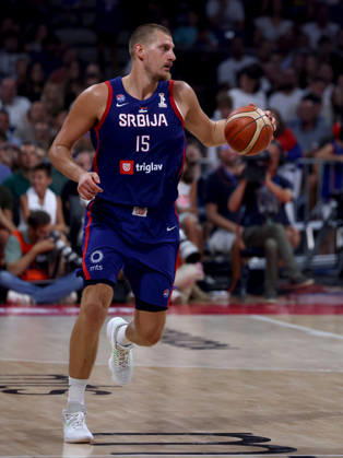 (260821) -- BELGRADE, Aug. 21, 2026 -- Serbia s Nikola Jokic controls the ball during a friendly basketball match between Serbia and France in Belgrade, Serbia on August 20, 2026. (Photo by Xinhua) (SP)SERBIA-BELGRADE-BASKETBALL-FRIENDLY-SERBIA-FRANCE DjordjexKostic 
