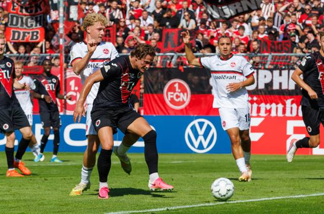 22.08.2026 - Fussball - Saison 2026 2027 - DFB Pokal Vereinspokal - 01. Runde: Viktoria Köln - 1. FC Nürnberg Nuernberg FCN ( Club ) - Sportfoto Zink DaMa - xdaxmax - regulations prohibit any use of photographs as image sequences and or quasi-video - Piet Scobel (19, 1. FC Nürnberg FCN ) Tobias Eisenhuth (6, FC Viktoria Köln )