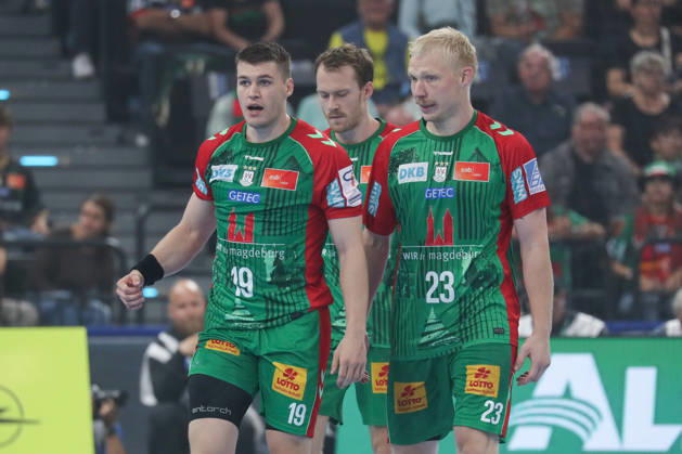 22.08.2026, xgox, Handball, Rexel Supercup 2026, SC Magdeburg - Füchse Berlin, v.l. Elvar Orn Jonsson (Magdeburg, 19), Felix Claar (Magdeburg, 7), Magnus Saugstrup (Magdeburg, 23) München
