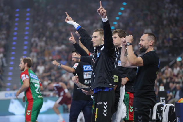 22.08.2026, xgox, Handball, Rexel Supercup 2026, SC Magdeburg - Füchse Berlin, v.l. Dominik Kuzmanovic (Magdeburg, 1) Jubelt ueber gehaltenen Ball, abgewehrt, gehalten, Torhueter München
