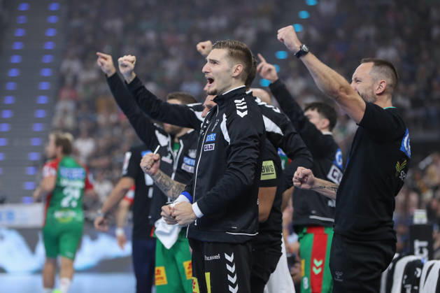 22.08.2026, xgox, Handball, Rexel Supercup 2026, SC Magdeburg - Füchse Berlin, v.l. Dominik Kuzmanovic (Magdeburg, 1) Jubelt ueber gehaltenen Ball, abgewehrt, gehalten, Torhueter München