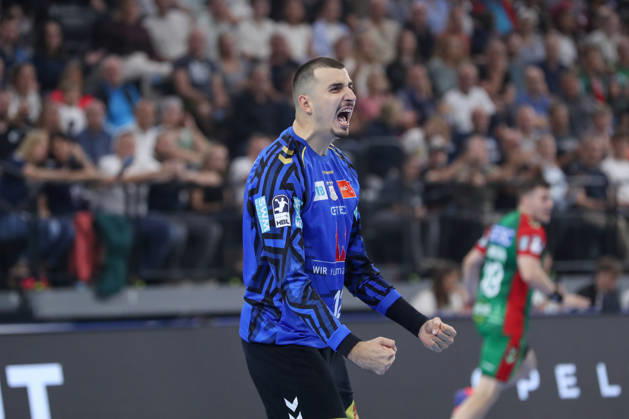 22.08.2026, xgox, Handball, Rexel Supercup 2026, SC Magdeburg - Füchse Berlin, v.l. Matej Mandic (Magdeburg, 12) Jubelt ueber gehaltenen Ball, abgewehrt, gehalten, Torhueter München