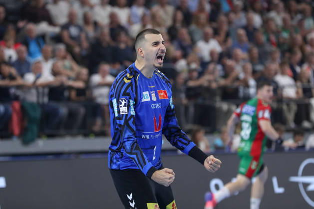 22.08.2026, xgox, Handball, Rexel Supercup 2026, SC Magdeburg - Füchse Berlin, v.l. Matej Mandic (Magdeburg, 12) Jubelt ueber gehaltenen Ball, abgewehrt, gehalten, Torhueter München