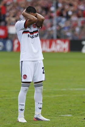 KOELN, GERMANY - AUGUST 22, 2026: Giannis Masouras (1. FC Nuernberg, 21) gestures after failing a penalty during the shootout during the DFB-Cup match between Viktoria Koeln vs. 1. FC Nuernberg at the Sportpark Hoehenberg on August 22, 2026 in Koeln, Germany. DFL REGULATIONS PROHIBIT ANY USE OF PHOTOGRAPHS AS IMAGE SEQUENCES AND OR QUASI-VIDEO. Nordrhein-Westfalen Germany Copyright: xAxelxKohringx