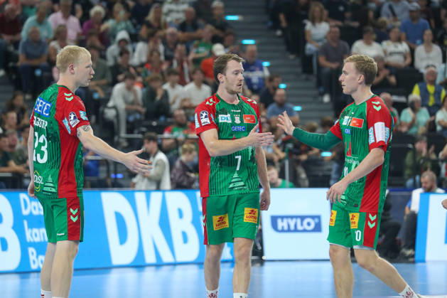 22.08.2026, xgox, Handball - Rexel Super-Cup, SC Magdeburg - Füchse Berlin emspor, v.l. Magnus Saugstrup (Magdeburg, 23), Felix Claar (Magdeburg, 7), Gisli Thorgeir Kristjansson (Magdeburg, 10) Jubel, Torjubel, jubelt ueber das Tor, celebrate the goal, celebration München