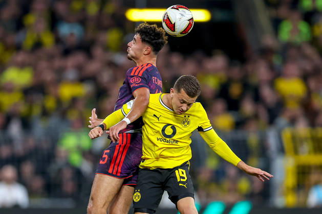 22.08.2026, Fußball, Borussia Dortmund - FC Bayern München, Signal Iduna Park, Saison 2026 2027: Aleksandar Pavlovic (FC Bayern München 45) im Zweikampf gegen Konstantinos Karetsas (BVB 19) DFB regulations prohibit any use of photographs as image sequences and or quasi-video. Nordrhein-Westfalen Deutschland