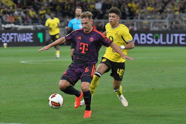 v. li. im Zweikampf Joshua Kimmich (Bayern 6) Samuele Inacio (Dortmund 40) 22.08.2026 ¢ Fussball ¢ Borussia Dortmund vs FC Bayern München ¢ Super Cup, Signal Iduna Park, Dortmund, DFB DFL REGULATIONS PROHIBIT ANY USE OF PHOTOGRAPHS AS IMAGE SEQUENCES AND OR QUASI-VIDEO NRW Germany