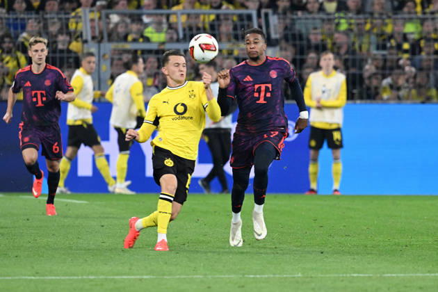 22.08.2026, xsltx, Fussball Franz Beckenbauer Supercup 2026, Borussia Dortmund - FC Bayern München v.l. Konstantinos Karetsas (Borussia Dortmund) Michael Olise (FC Bayern Muenchen) Zweikampf, Aktion, action, battle for the ball (DFL DFB REGULATIONS PROHIBIT ANY USE OF PHOTOGRAPHS as IMAGE SEQUENCES and or QUASI-VIDEO) Dortmund