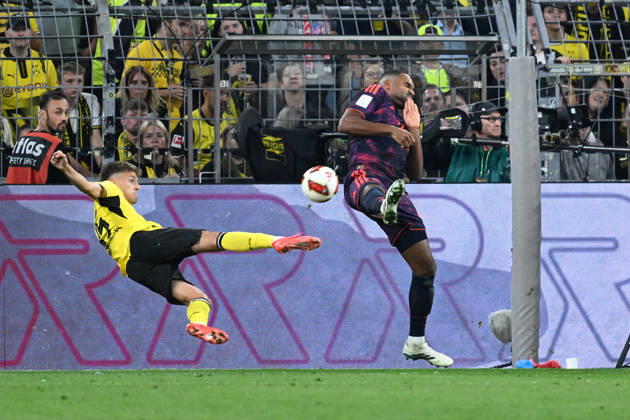 22.08.2026, xsltx, Fussball Franz Beckenbauer Supercup 2026, Borussia Dortmund - FC Bayern München v.l. Giannis Konstantelias (Borussia Dortmund) Jonathan Tah (FC Bayern Muenchen) Zweikampf, Aktion, action, battle for the ball (DFL DFB REGULATIONS PROHIBIT ANY USE OF PHOTOGRAPHS as IMAGE SEQUENCES and or QUASI-VIDEO) Dortmund