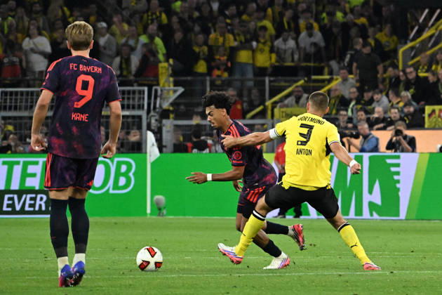 22.08.2026, xsltx, Fussball Franz Beckenbauer Supercup 2026, Borussia Dortmund - FC Bayern München v.l. Nathaniel Brown (FC Bayern Muenchen) Waldemar Anton (Borussia Dortmund) Zweikampf, Aktion, action, battle for the ball (DFL DFB REGULATIONS PROHIBIT ANY USE OF PHOTOGRAPHS as IMAGE SEQUENCES and or QUASI-VIDEO) Dortmund