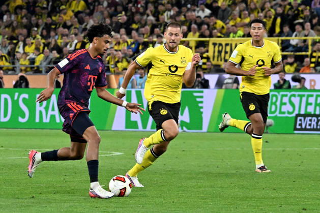 22.08.2026, xsltx, Fussball Franz Beckenbauer Supercup 2026, Borussia Dortmund - FC Bayern München v.l. Nathaniel Brown (FC Bayern Muenchen) Waldemar Anton (Borussia Dortmund) Zweikampf, Aktion, action, battle for the ball (DFL DFB REGULATIONS PROHIBIT ANY USE OF PHOTOGRAPHS as IMAGE SEQUENCES and or QUASI-VIDEO) Dortmund