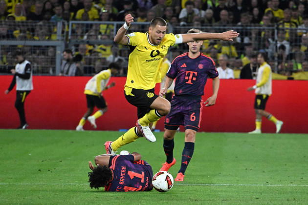 22.08.2026, xsltx, Fussball Franz Beckenbauer Supercup 2026, Borussia Dortmund - FC Bayern München v.l. Nathaniel Brown (FC Bayern Muenchen) Waldemar Anton (Borussia Dortmund) Zweikampf, Aktion, action, battle for the ball Joshua Kimmich (FC Bayern Muenchen) (DFL DFB REGULATIONS PROHIBIT ANY USE OF PHOTOGRAPHS as IMAGE SEQUENCES and or QUASI-VIDEO) Dortmund
