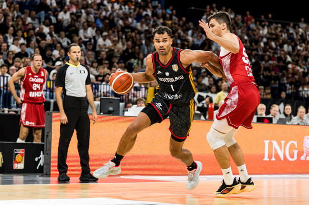 HAMBURG, GERMANY - AUGUST 22: Oscar Da Silva (Germany, 1) controls the ball during the Turkish Airlines Basketball Supercup final match between Germany vs. Croatia at Barclays Arena on August 22, 2026 in Hamburg, Germany. Hamburg Germany Copyright: xSteffiexWunderlx