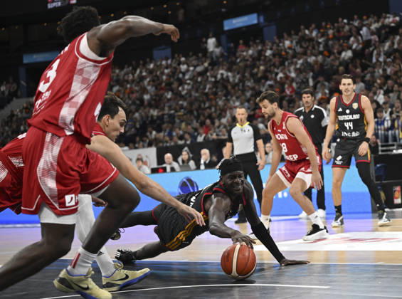 Germany v Croatia - Turkish Airlines Supercup 2026 HAMBURG, GERMANY - AUGUST 22: Germany s Isaac Bonga (C) in action during the Turkish Airlines Basketball Supercup 2026 match between Germany and Croatia at Barclays Arena in Hamburg, Germany, on August 22, 2026. Halil Sagirkaya Anadolu Hamburg Germany. Editorial use only. Please get in touch for any other usage.  Copyright: x2026xAnadoluxHalilxSagirkayax