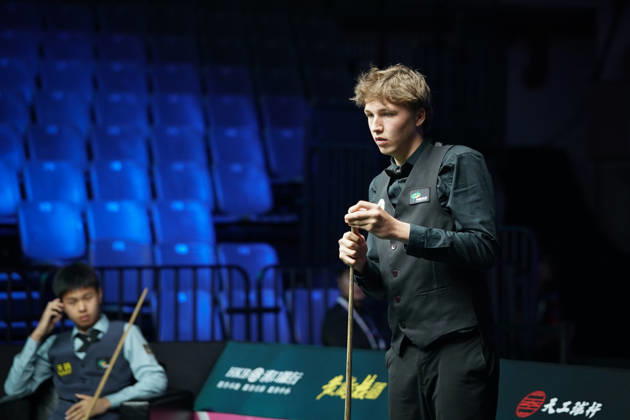 WUHAN, CHINA - AUGUST 23: Ben Mertens of Belgium chalks the cue in the first round match against Wang Xinzhong of China on day 1 of Wuhan Open 2026 at the Optics Valley Gymnasium of Huazhong University of Science and Technology on August 23, 2026 in Wuhan, Hubei Province of China.  Copyright: xTaixChengzhex 111661617839