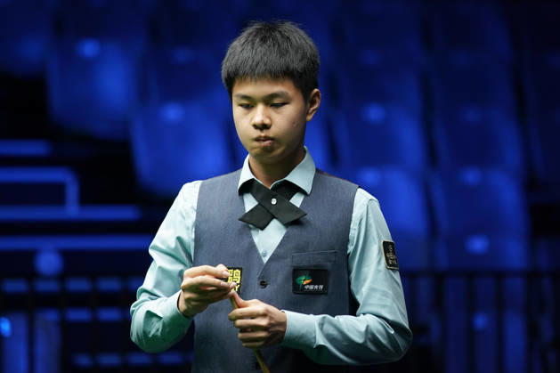 WUHAN, CHINA - AUGUST 23: Wang Xinzhong of China chalks the cue in the first round match against Ben Mertens of Belgium on day 1 of Wuhan Open 2026 at the Optics Valley Gymnasium of Huazhong University of Science and Technology on August 23, 2026 in Wuhan, Hubei Province of China. Copyright: xTaixChengzhex 111661617828