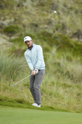 BALMEDIE, SCOTLAND - AUG 23: Lukas Nemecz (AUT) chips to the 1st green during Round 4 at the 2026 Nexo Championship at the Trump International Golf Links, Balmedie on August 23, 2026 in Aberdeenshire, Scotland The 2026 Nexo Championship