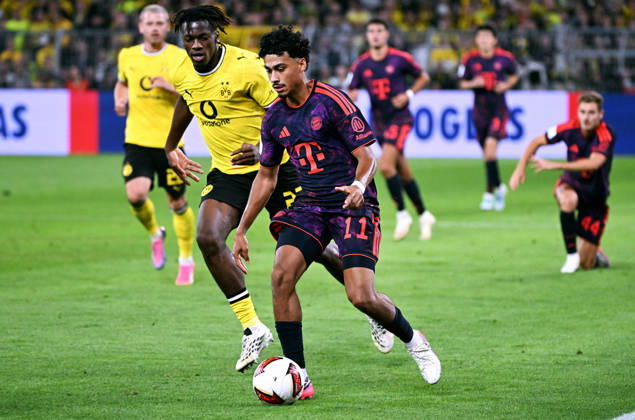 Dortmund, Germany, 1. Bundesliga, Supercup, Signal Iduna Park Dortmund, Bor. Dortmund vs FC Bayern München 1:2; Nathaniel Brown (FCB), Joane Gadou (BVB). Action