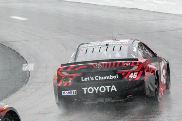 LOUDON, NH - AUGUST 23: Pole sitter, Tyler Reddick ( 45 23XI Racing Chumba Casino Toyota) kicks up some spray on the parade laps prior to the start of the NASCAR, Motorsport, USA Cup Series Dollar Tree 301 on August 23, 2026, at New Hampshire Motor Speedway in Loudon, NH. (Photo by David Hahn Icon Sportswire) AUTO: AUG 23 NASCAR Cup Series Dollar Tree 301 EDITORIAL USE ONLY Icon260823003