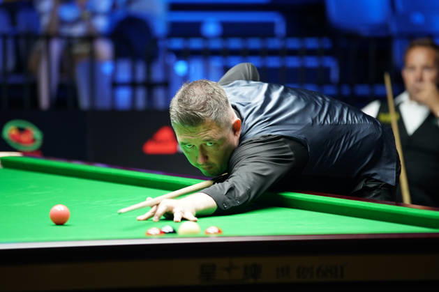 WUHAN, CHINA - AUGUST 25: Kyren Wilson of England plays a shot in the third round match against Ali Carter of England on day 3 of Wuhan Open 2026 at the Optics Valley Gymnasium of Huazhong University of Science and Technology on August 25, 2026 in Wuhan, Hubei Province of China.  Copyright: xTaixChengzhex 111662031242