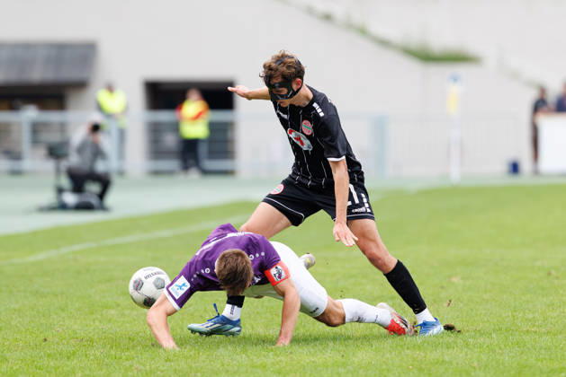 Kilian Pittrich (21, TSV Landsberg) und Dennis Ruisinger (5, TSV Schwaben Augsburg) beim Spiel zwischen TSV Landsberg v TSV Schwaben Augsburg, Fussball, Herren, Toto-Pokal, 2026 2027, Achtelfinale am 25.08.2026 in Landsberg am Lech, Sportpark. Bayern Deutschland