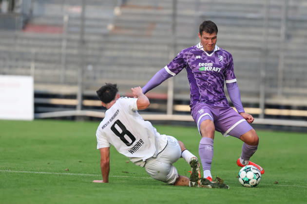 Toto-Pokal; SV Wacker Burghausen - FC Ingolstadt 04; Zweikampf Kampf um den Ball Simon Lorenz (32, FCI) Ben Hagmeyer (8 SVWB) Toto-Pokal - SV Wacker Burghausen - FC Ingolstadt 04 Saison 2026 2027