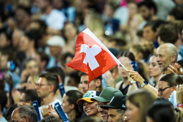 ZÜRICH, SWITZERLAND - AUGUST 27: A Swiss flag is waved at Diamond League: Weltklasse Zürich on August 27, 2026 in the Stadion Letzigrund, Zürich, Switzerland. Copyright: xUlfxSchillerx