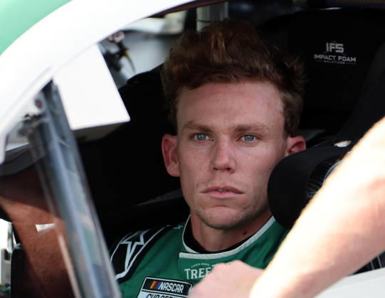 DAYTONA BEACH, FL - AUGUST 28: Riley Herbst ( 35 23XI Racing TREETOP Toyota) waits in his car before qualifying for the NASCAR, Motorsport, USA Cup Series Coke Zero Sugar 400 on August 28, 2026 at Daytona International Speedway in Daytona Beach, FL. (Photo by Michael Bush Icon Sportswire) AUTO: AUG 28 NASCAR Cup Series Coke Zero Sugar 400 EDITORIAL USE ONLY Icon260828024400