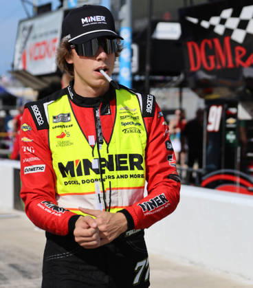 DAYTONA BEACH, FL - AUGUST 28: Carson Hocevar ( 77 Spire Motorsports Miner Docks, Doors and More Chevrolet) walks on pit road before qualifying for the NASCAR, Motorsport, USA Cup Series Coke Zero Sugar 400 on August 28, 2026 at Daytona International Speedway in Daytona Beach, FL. (Photo by Michael Bush Icon Sportswire) AUTO: AUG 28 NASCAR Cup Series Coke Zero Sugar 400 EDITORIAL USE ONLY Icon260828031400