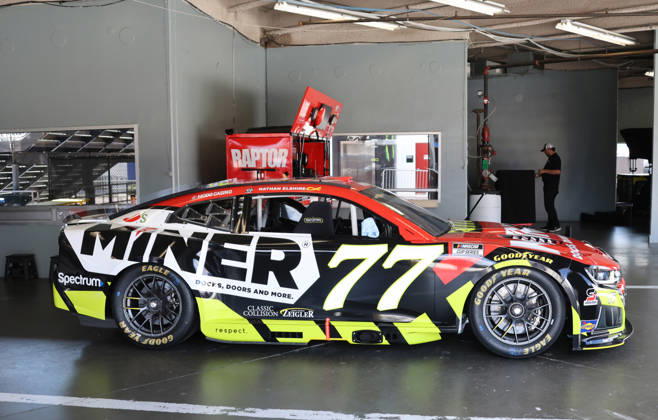 DAYTONA BEACH, FL - AUGUST 28: Carson Hocevar ( 77 Spire Motorsports Miner Docks, Doors and More Chevrolet) car sits in his garage before qualifying for the NASCAR, Motorsport, USA Cup Series Coke Zero Sugar 400 on August 28, 2026 at Daytona International Speedway in Daytona Beach, FL. (Photo by Michael Bush Icon Sportswire) AUTO: AUG 28 NASCAR Cup Series Coke Zero Sugar 400 EDITORIAL USE ONLY Icon260828007