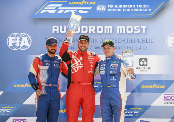 Czech Truck Prix, European circuit truck championship, took place place in Most, Czech Republic, on August 29, 2026. From left, Jose Eduardo Teixeira Rodrigues from Portugal, who jumped second, winner Norbert Kiss from Hungary, and Sascha Lenz from Germany, who finished third in the first race of the first day of competition. (CTKxPhoto OndrejxHajek) CTKPhotoP2026082903471 CTKPhotoP2026082903471