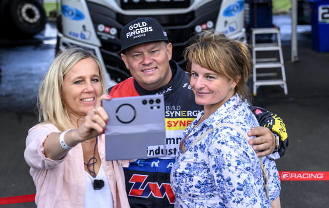 Czech Truck Prix, European circuit truck championship, took place place in Most, Czech Republic, on August 29, 2026. Adam Lacko from the Czech Republic (center) takes a photo with fans. (CTKxPhoto OndrejxHajek) CTKPhotoP2026082903611  CTKPhotoP2026082903611