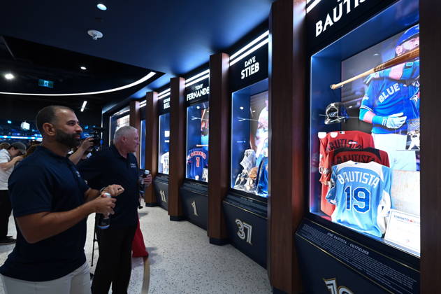 August 29, 2026, Toronto, On, CANADA: Former Toronto Blue Jays player Jose Bautista looks at his display during the opening of the team s new Hall of Excellence at Rogers Centre in Toronto on Saturday, Aug. 29, 2026. Canada News - August 29, 2026  - ZUMAc35_ 20260829_zaf_c35_023 Copyright: xJonxBlackerx