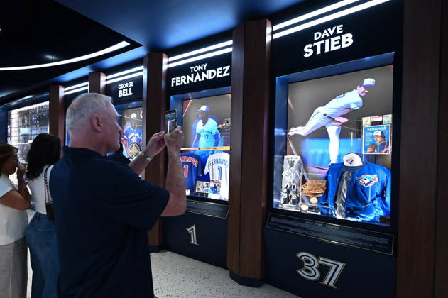 August 29, 2026, Toronto, On, CANADA: Former Toronto Blue Jays player Dave Stieb takes a picture of his display during the opening of the team s new Hall of Excellence at Rogers Centre in Toronto on Saturday, Aug. 29, 2026. Canada News - August 29, 2026  - ZUMAc35_ 20260829_zaf_c35_026 Copyright: xJonxBlackerx
