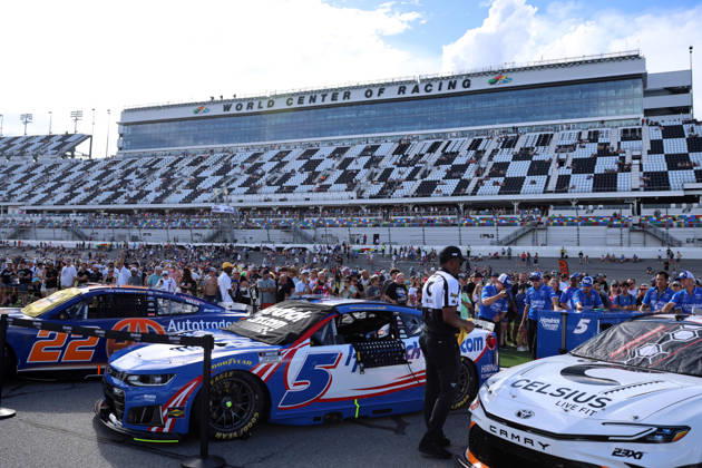 DAYTONA BEACH, FL - AUGUST 29: A general view of the grid on pit road with the granstands behind prior to the NASCAR, Motorsport, USA Cup Series Coke Zero Sugar 400 on August 29, 2026 at Daytona International Speedway in Daytona Beach, FL. (Photo by Michael Bush Icon Sportswire) AUTO: AUG 29 NASCAR Cup Series Coke Zero Sugar 400 EDITORIAL USE ONLY Icon260829009