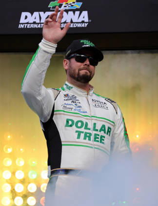 DAYTONA BEACH, FL - AUGUST 29: Erik Jones ( 43 LEGACY MOTOR CLUB Dollar Tree Toyota) waves to the crowd during driver introduction prior to the NASCAR, Motorsport, USA Cup Series Coke Zero Sugar 400 on August 29, 2026 at Daytona International Speedway in Daytona Beach, FL. (Photo by Michael Bush Icon Sportswire) AUTO: AUG 29 NASCAR Cup Series Coke Zero Sugar 400 EDITORIAL USE ONLY Icon260829013