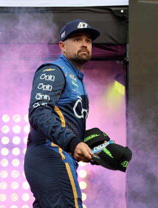 DAYTONA BEACH, FL - AUGUST 29: Ricky Stenhouse ( 47 HYAK Motorsports Onin Staffing Chevrolet) tosses hats to the crowd during driver introduction prior to the NASCAR, Motorsport, USA Cup Series Coke Zero Sugar 400 on August 29, 2026 at Daytona International Speedway in Daytona Beach, FL. (Photo by Michael Bush Icon Sportswire) AUTO: AUG 29 NASCAR Cup Series Coke Zero Sugar 400 EDITORIAL USE ONLY Icon260829025