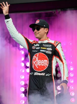 DAYTONA BEACH, FL - AUGUST 29: Christopher Bell ( 20 Joe Gibbs Racing Rheem Toyota) waves to the crowd during driver introduction prior to the NASCAR, Motorsport, USA Cup Series Coke Zero Sugar 400 on August 29, 2026 at Daytona International Speedway in Daytona Beach, FL. (Photo by Michael Bush Icon Sportswire) AUTO: AUG 29 NASCAR Cup Series Coke Zero Sugar 400 EDITORIAL USE ONLY Icon260829026