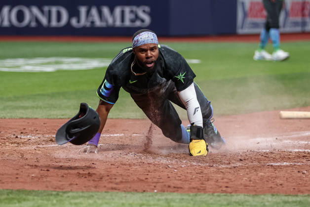 August 29, 2026, St. Petersburg, Florida, USA: Tampa Bay Rays center fielder CEDRIC MULLINS (31) slides into home to score a run against the San Diego Padres. The Tampa Bay Rays hosted the San Diego Padres at Tropicana Field in St. Petersburg. MLB, Baseball Herren, USA 2026: Rays 7:6 Padres  - ZUMAm299 20260829_znp_m299_006 Copyright: xTaylorxMcFeex