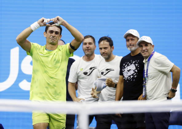 Mariano Navone of Argentina celebrates after match point in his match against Novak Djokovic of Serbia in Arthur Ashe Stadium in the first round at the 2026 US Open Tennis Championship at the USTA Billie Jean King National Tennis Center in New York City on Sunday, August 30, 2026. Navone defeated Djokovic in 5 sets.  NYP20260830157 JOHNxANGELILLO