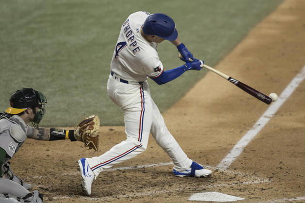 August 31, 2026, Arlington, Texas, USA: Texas Rangers catcher LOGAN OHOPPE (4) hits a double against the Athletics at Globe Life Field. Rangers win 8-1. Arlington USA - ZUMAf180 20260831_zsp_f180_023 Copyright: xMarkxFannx
