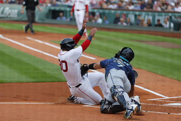 Boston Red Sox s Mickey Gasper, left, is tagged out at home plate by Seattle Mariners catcher Jhonny Pereda, right, during the first inning at Fenway Park in Boston, Massachusetts on Wednesday, September 2, 2026.  BOP20260902005 CJxGUNTHER