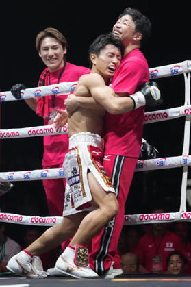 Boxing: WBA minimumweight title match Japanese boxer Takeshi Ishii (C) celebrates after knocking out Wilfredo Mendez of Puerto Rico in the first round of their WBA minimumweight world title match at Yokohama Buntai in Yokohama, near Tokyo, on Sept. 2, 2026. Ishii rewrote Naoya Inoue s record for the fastest knockout by a Japanese male boxer in a world title bout.  A14AA0005627029P
