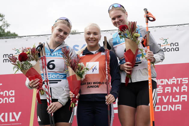 From left, Lisa Alrik of Sweden, second place, Emilie Ruud Lia of Norway, first place, and Matilda Grahn of Sweden, third place, celebrate after the Junior Women mass start race of the FIS Rollerski World Championships 2026 in Madona, Latvia, on September 6, 2026. Madona Latvia Copyright: xRomanxKoksarovx RKV01421.JPG