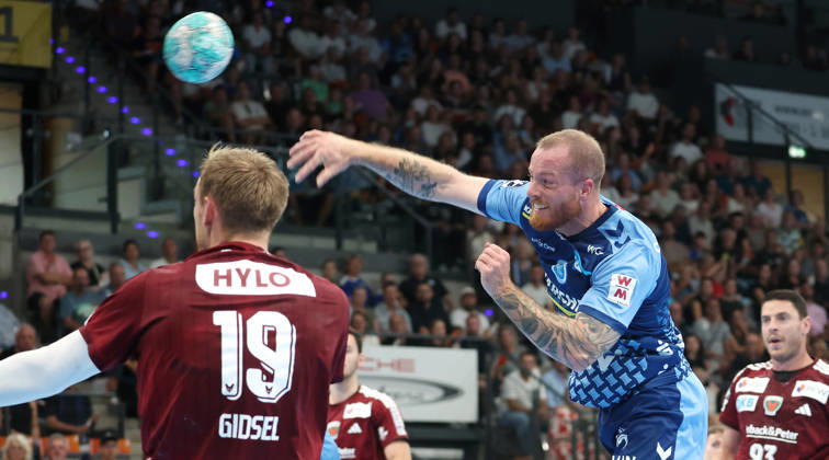 2026.09.06, Deutschland, Stuttgart, Handball TVB Stuttgart vs. Füchse Berlin, v.l. Mathias Gisdel (Berlin), Patrick Zieker (TVB)