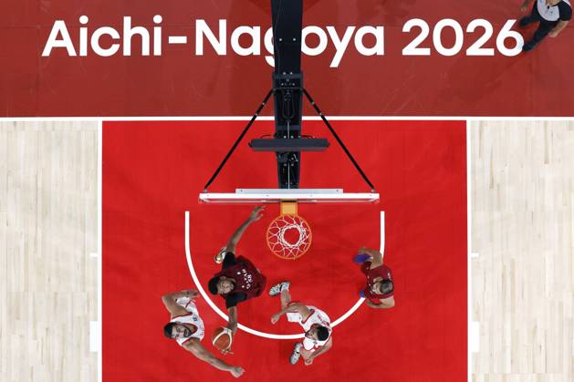 Asian Games: Basketball Players from Qatar and Iran compete in a men s basketball game at the Asian Games at Aichi International Arena in Nagoya, central Japan, on Sept. 10, 2026, as competition gets under way ahead of the Sept. 14 opening ceremony.  A14AA0005627379P