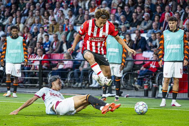 EINDHOVEN - Kodai Sano of PSV Eindhoven battles for possession with Isaque of Shakhtar Donetsk during the UEFA Champions League match between PSV Eindhoven and Shakhtar Donetsk at the Philips Stadium on 10 September 2026 in Eindhoven, the Netherlands. KEVIN SENDERS ANP UEFA Champions League 2026 27 xVIxANPxSportx xMarcelxterxBalsxIVx 567926592 originalFilename: 567926592