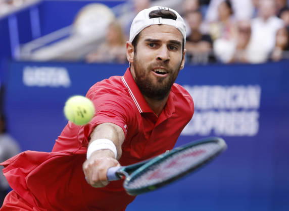 Karen Khachanov hits a backhand return to Alexander Zverev of Germany during the second set of the Men s semifinals in Arthur Ashe Stadium at the 2026 US Open Tennis Championship at the USTA Billie Jean King National Tennis Center in New York City on Friday, September 11, 2026.  NYP20260911819 JOHNxANGELILLO