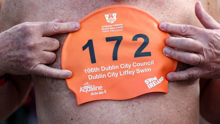 REPRO FREE *PRESS RELEASE NO REPRODUCTION FEE* EDITORIAL USE ONLY 106th Dublin City Liffey Swim 2026, River Liffey, Dublin 12 9 2026 A view of Phillip Ellis swim hat as he prepares to enter the water A view of Phillip Ellis swim hat as he prepares to enter the water 12 9 2026  Copyright: xx DANS2689