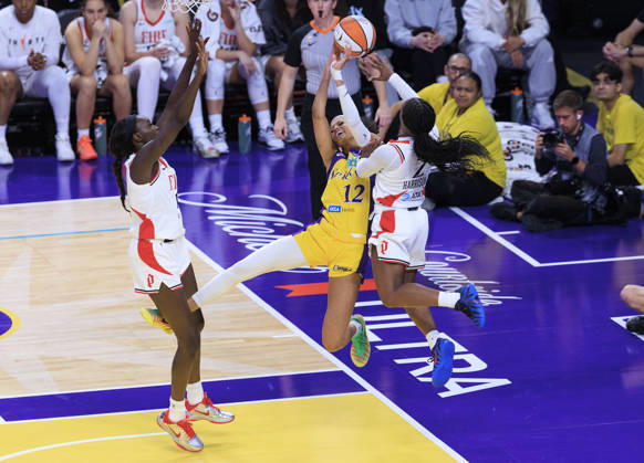 September 20, 2026, Los Angeles, California, USA: Jordan Harrison 2 of the Portland Fire fouls Rae Burrell 12 of the Los Angeles Sparks on a layup during their regular season WNBA, Basketball Damen, USA game on Sunday September 20, 2026 at Crypto.com Arena in Los Angeles, California. Sparks defeat Fire, 105-84. ARIANA RUIZ PI Sparks Defeat Fire, 105-84 - ZUMAp124 20260920_zaa_p124_116 Copyright: xArianaxRuizx